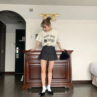 Pleated denim mini skirt