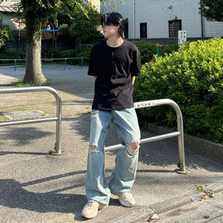 Distressed wide-leg denim pants