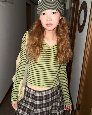 Keyhole neckline striped long-sleeve knit