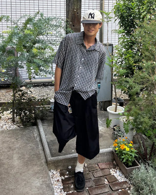Double-pleated Bermuda shorts