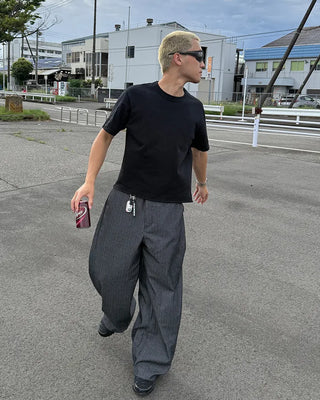 Side-tuck denim slacks
