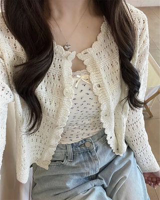 Wave punching cardigan