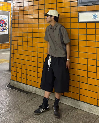 Double-pleated Bermuda shorts