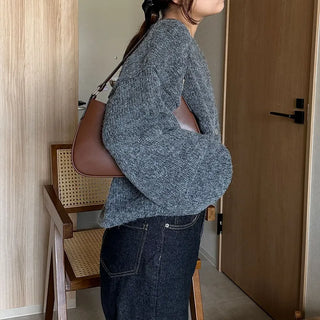 Loose-fitting button-up wool cardigan