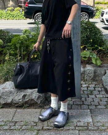 Cross-embroidered Bermuda shorts