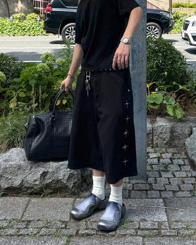 Cross-embroidered Bermuda shorts