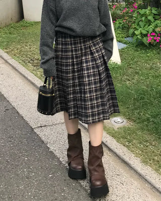Checked pleated midi skirt