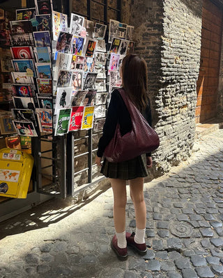 Checkered button pleated mini skirt