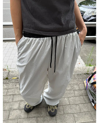 Side Round Point Windbreaker Pants