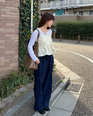 Lace-line shirred sleeveless blouse