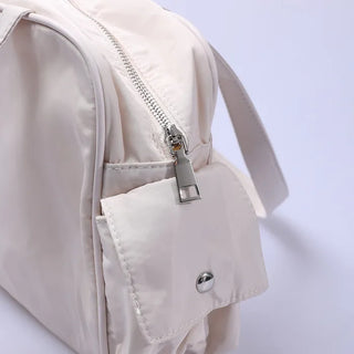 Two-pocket buckle shoulder bag