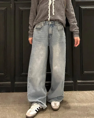 Wide-leg denim with side pleats