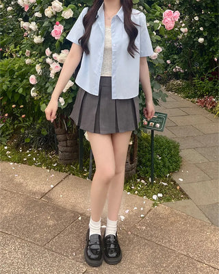 Big pleated mini skirt