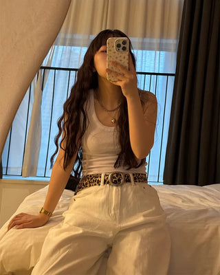 Round leopard belt