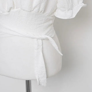 Back ribbon cropped blouse