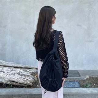 Drawstring pocket shoulder bag