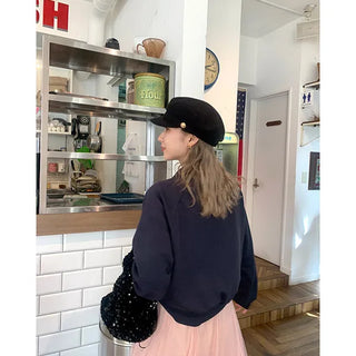 Gold button beret