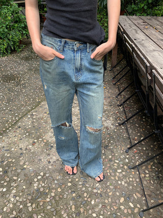 old ripped jeans