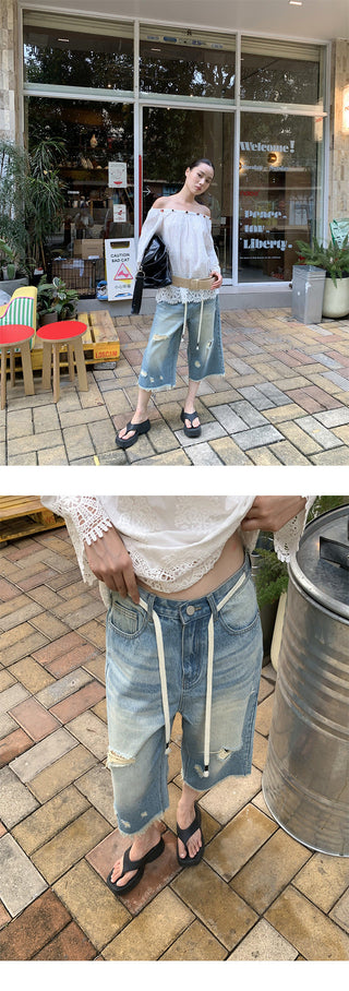 tattered wide jeans