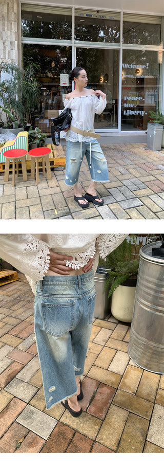 tattered wide jeans