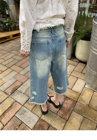 tattered wide jeans