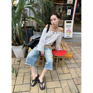 tattered wide jeans