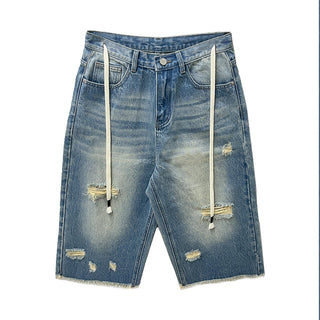 tattered wide jeans