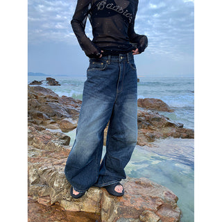 pleated denim jeans