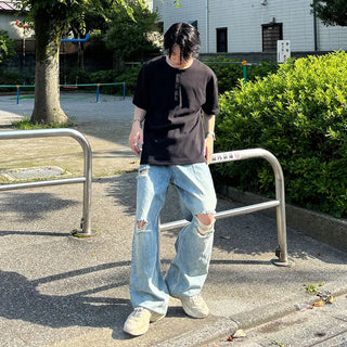 Distressed wide-leg denim pants