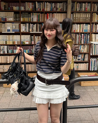 Shirred tiered pleated mini skirt