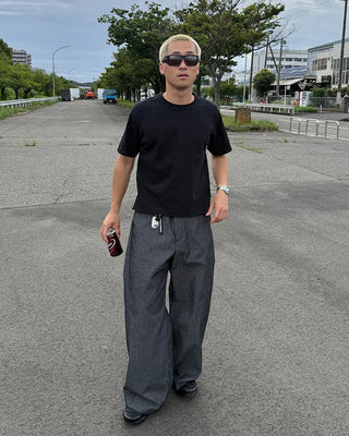 Side-tuck denim slacks