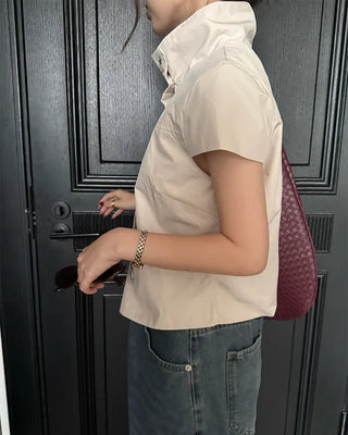 Cap-sleeve button-up high-neck blouse
