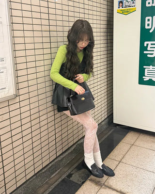 One-button leather handbag
