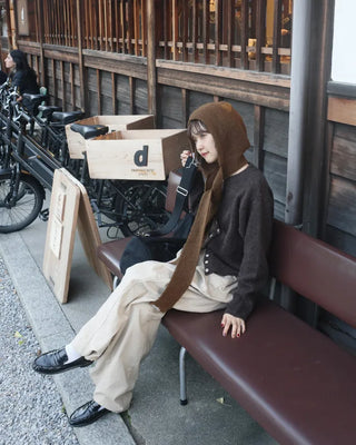 Side-tucked white cotton pants