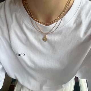 Layered buckle necklace