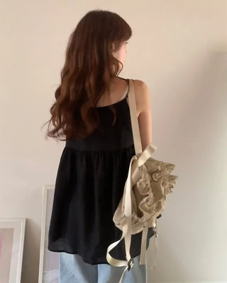 Back-button sleeveless blouse