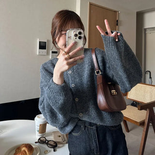 Loose-fitting button-up wool cardigan