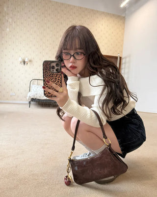 Off-shoulder loose-fit knit