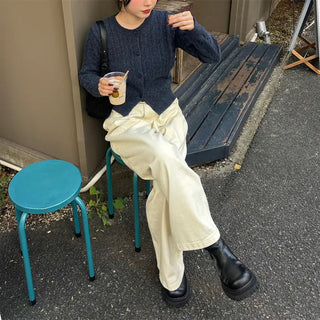 Tucked wide-leg pants