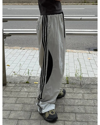 Side Round Point Windbreaker Pants