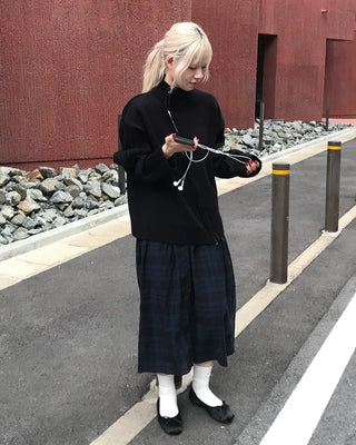 Asymmetrical pleated knit zip-up