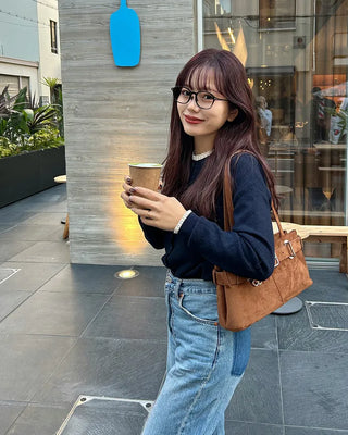 Suede buckle shoulder bag