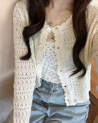 Wave punching cardigan