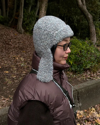 Knit hat with button ear flaps
