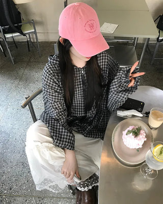 Drawstring hem check windbreaker