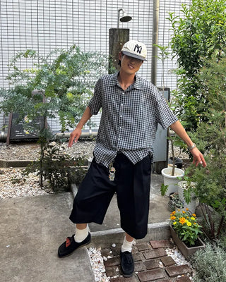 Double-pleated Bermuda shorts