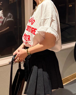Double-belted pinstripe mini skirt