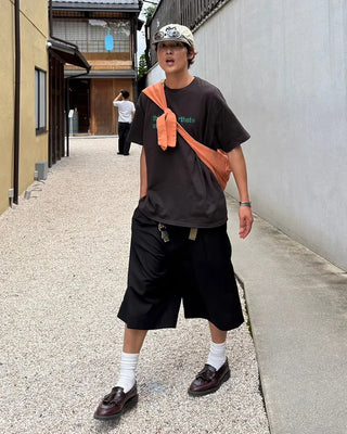 Double-pleated Bermuda shorts