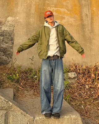 Pointed denim pants with contrasting panels