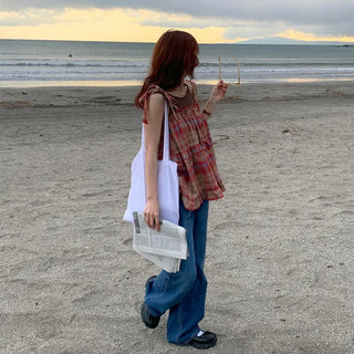 Checked sleeveless blouse